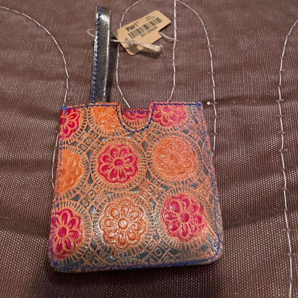 Leather case with attached mirror